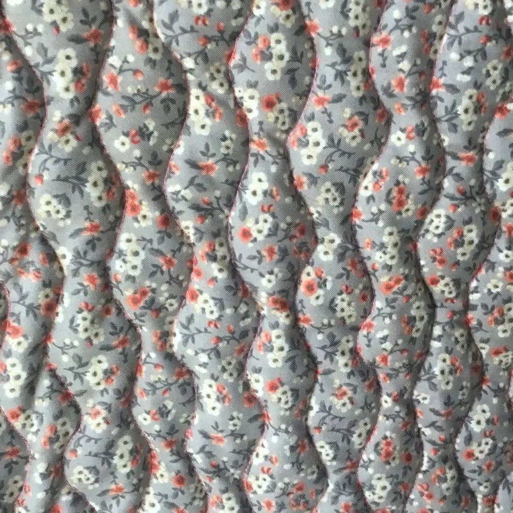 NWT. Hand Crafted Quilt in Corals